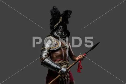 Photograph Ancient Roman Gladiator With Spear And Plumed Helmet 196565717