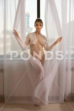 Attractive Naked Woman Hiding Behind Tulle Curtains Full Length Of