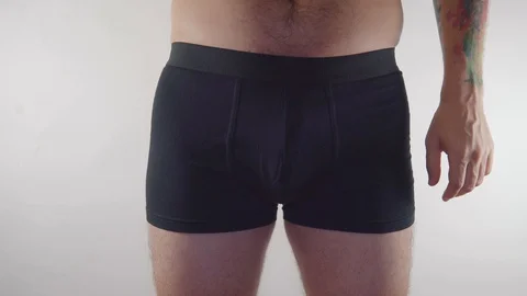 Close Up Of A Man In Underwear Holding A Stock Video Pond