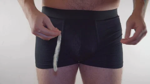 Close Up Of A Man In Underwear Holding A Stock Video Pond