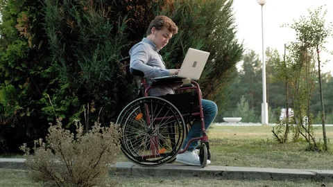 A Disabled Man Is Sitting In A Wheelchai Stock Video Pond