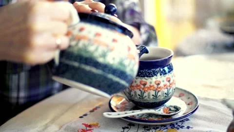 Female Hand Pouring Tea Into Cup 120fps Stock Video Pond5