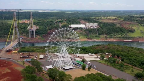 Ferris Wheel At Border Between Brazil Pa Stock Video Pond