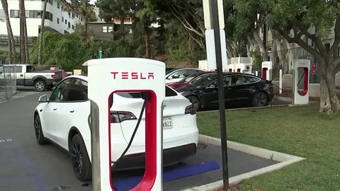 Gm Embraces Tesla S Ev Charging System Stock Video Pond