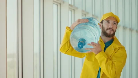 Handsome Delivery Man In Yellow Uniform Stock Video Pond