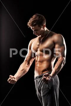 Image Of Very Muscular Man Posing With Naked Torso Stock Image