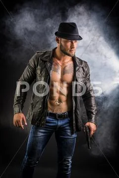 Man Wearing Leather Jacket On Naked Muscular Torso Stock Image 64086116