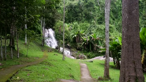 Paths Leading To Monthathan Waterfall In Stock Video Pond