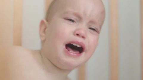 Portrait Of Crying Screaming Naked Baby Stock Video Pond