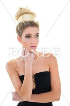 Severe Attractive Blonde Model With Big Hairstyle Posing For Camera