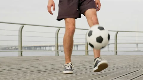 Soccer Player Juggling Ball With His Fee Stock Video Pond