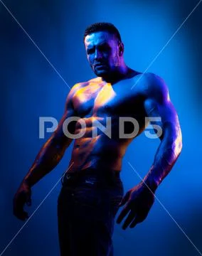 Topless Shirtless Male Model Naked Bodybuilder On Blue Neon Light