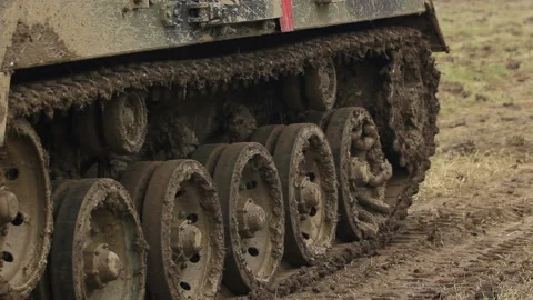 Two Armoured Military Mini Tanks Driving Stock Video Pond