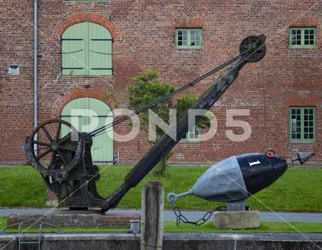 Historic barrel crane in the port of T+Ânning, Germany