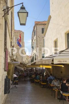 Restaurants in the alleys of the historic old town in Dubrovnik, Croatia