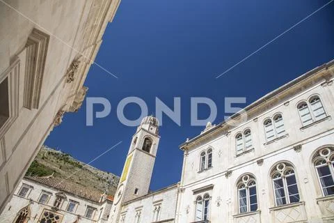 Sponza palace and city tower with deep blue sky in Dubrovnik, Croatia