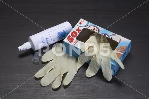 Hygiene spray and latex gloves - bottleneck, empty, used up