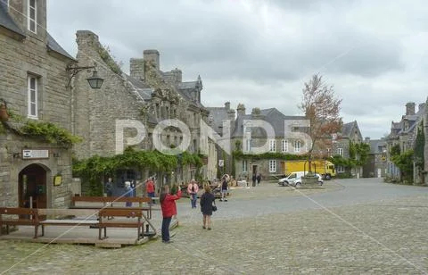Tourist crowd of the small Breton town of Locronan, France