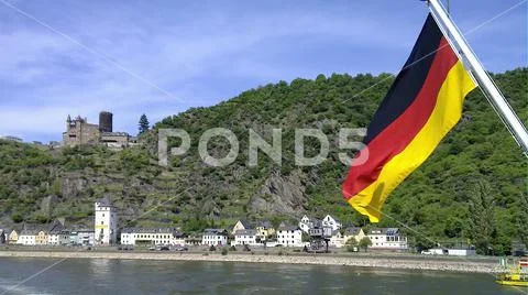 Shipping on the Rhine at Sankt Goarshausen with German flag