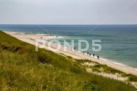 Sylt beach with walkers