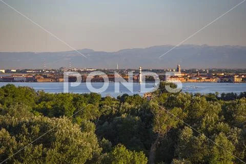 Venice lagoon and city view, Italy with Alps in morning