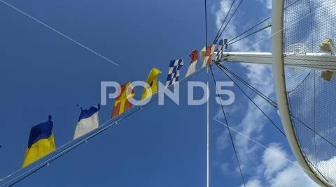 Flags on a ship flagpole