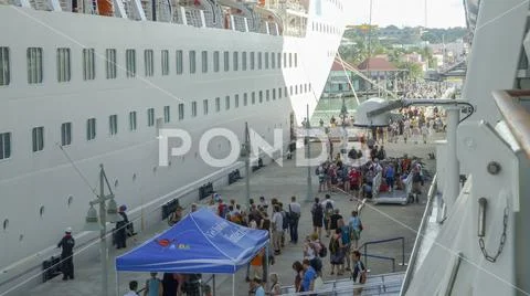 Cruise tourists flood the Caribbean island
