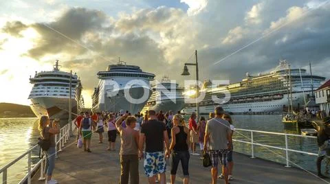 Cruise tourists flood the Caribbean island