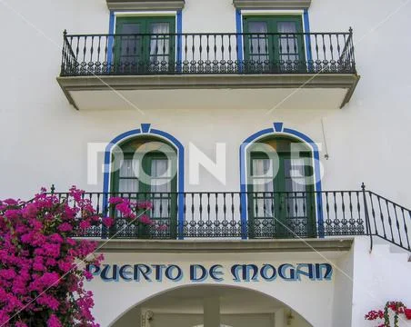 House facade in the port of Puerto de Mogan, Spain