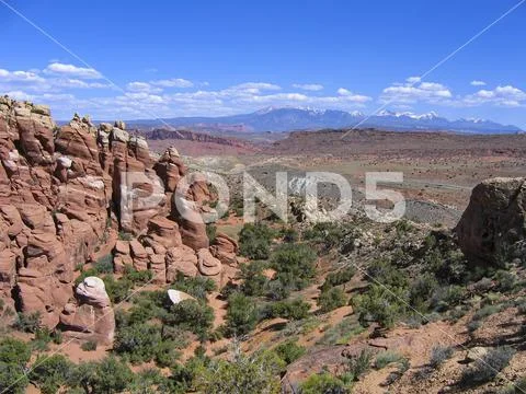 Arches National Park with snow-capped mountains