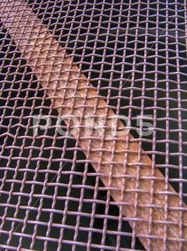 Braided steel mesh in the disused industrial area