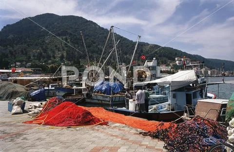 Fishermen and fishing boats in Bodrum harbor