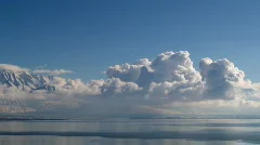 Cloud TimeLapse over lake with Mountains 