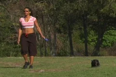 Female Athlete Walks Her Dog