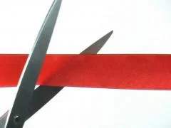red ribbon cutting