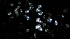 Explosion and diamonds flying towards camera