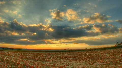 Hdr motion time lapse of sunset over corn fields