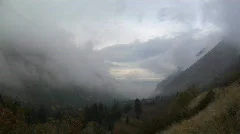 Clouds and Fog Float on the Mountain and Recede into Valley Below 2 Timelapse