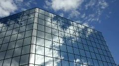 Timelapse of Clouds reflected in Corporate Office Building