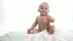 Baby Sitting on Towel