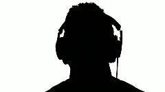 Silhouette of Music Fan Listening on Headphones Man Listens Bobs Head
