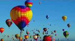 Balloons float across the sky at the Albuquerque balloon festival.