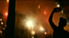 Man under fireworks bombing 01 - Vintage 8mm Film