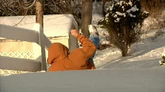 Man in Snow Slips and Falls in Slow Motion