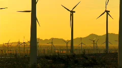 Sunset silhouette of wind farm