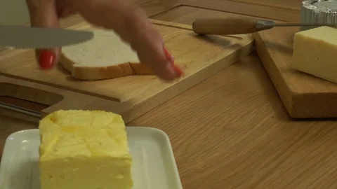 00068 Buttering bread Video stock 93550187