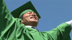 Young excited Asian man after graduation