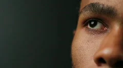African American man's eyes, looking up