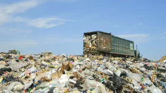 Landfill Trash Time-Lapse Scene with Dump Trucks