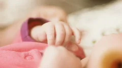 stock footage motherhood hands of the infant and adult